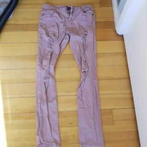 Blush pink distressed jeans